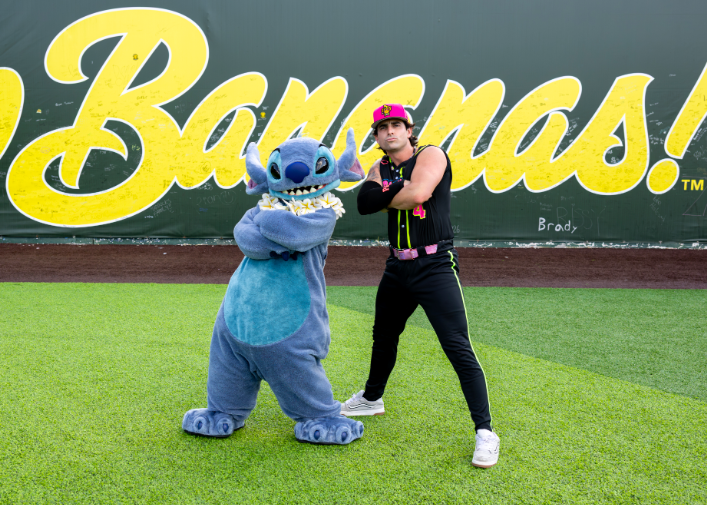 Stitch posing with a Party Animals player at Banana Ball, ESPN Wide World of Sports Complex at Walt Disney World