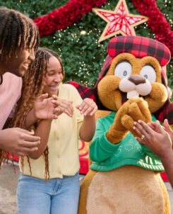 Earl the Squirrel meeting guests in front of the Christmas tree at Universal Studios Florida, Universal Orlando Resort