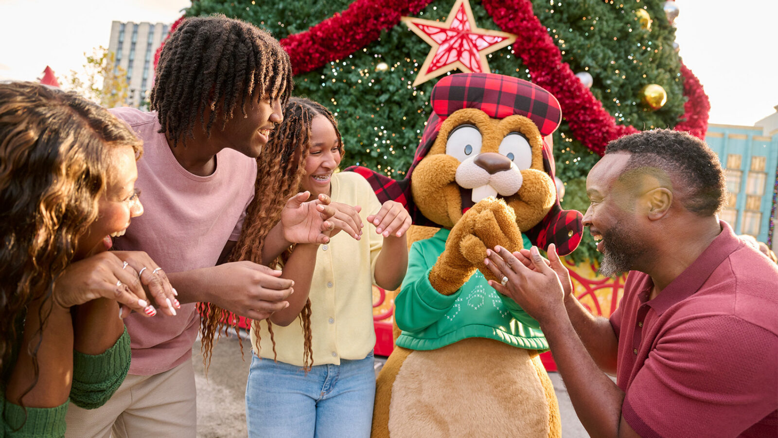 Earl the Squirrel meeting guests in front of the Christmas tree at Universal Studios Florida, Universal Orlando Resort
