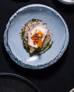 Swan and Dolphin Food and Wine Classic 2026 menu: Oyster Espuma from Todd English’s bluezoo among tasting plates and wine at the Walt Disney World Swan and Dolphin
