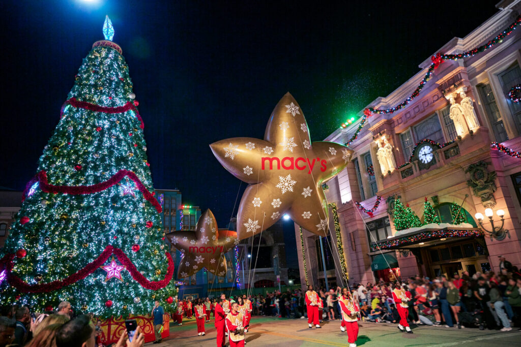 Universal's Holiday Parade featuring Macy's passing the Christmas tree at Universal Studios Florida